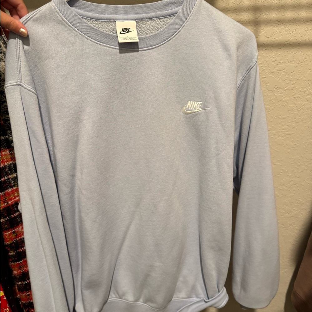 Nike women’s Soft Blue Crewneck Sweater
